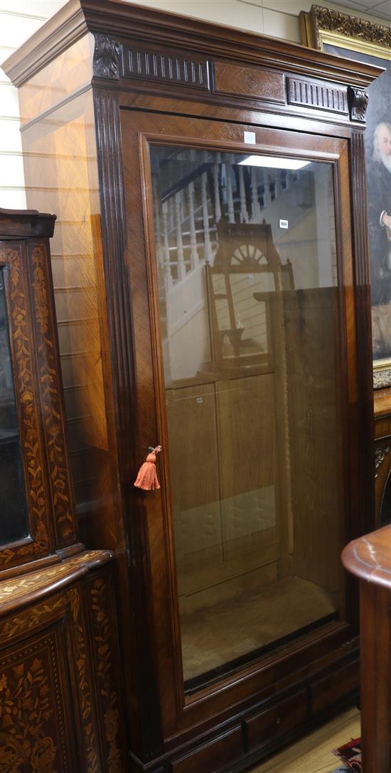 A 19th century French kingwood bookcase, enclosed by a single glazed door W.108cm
